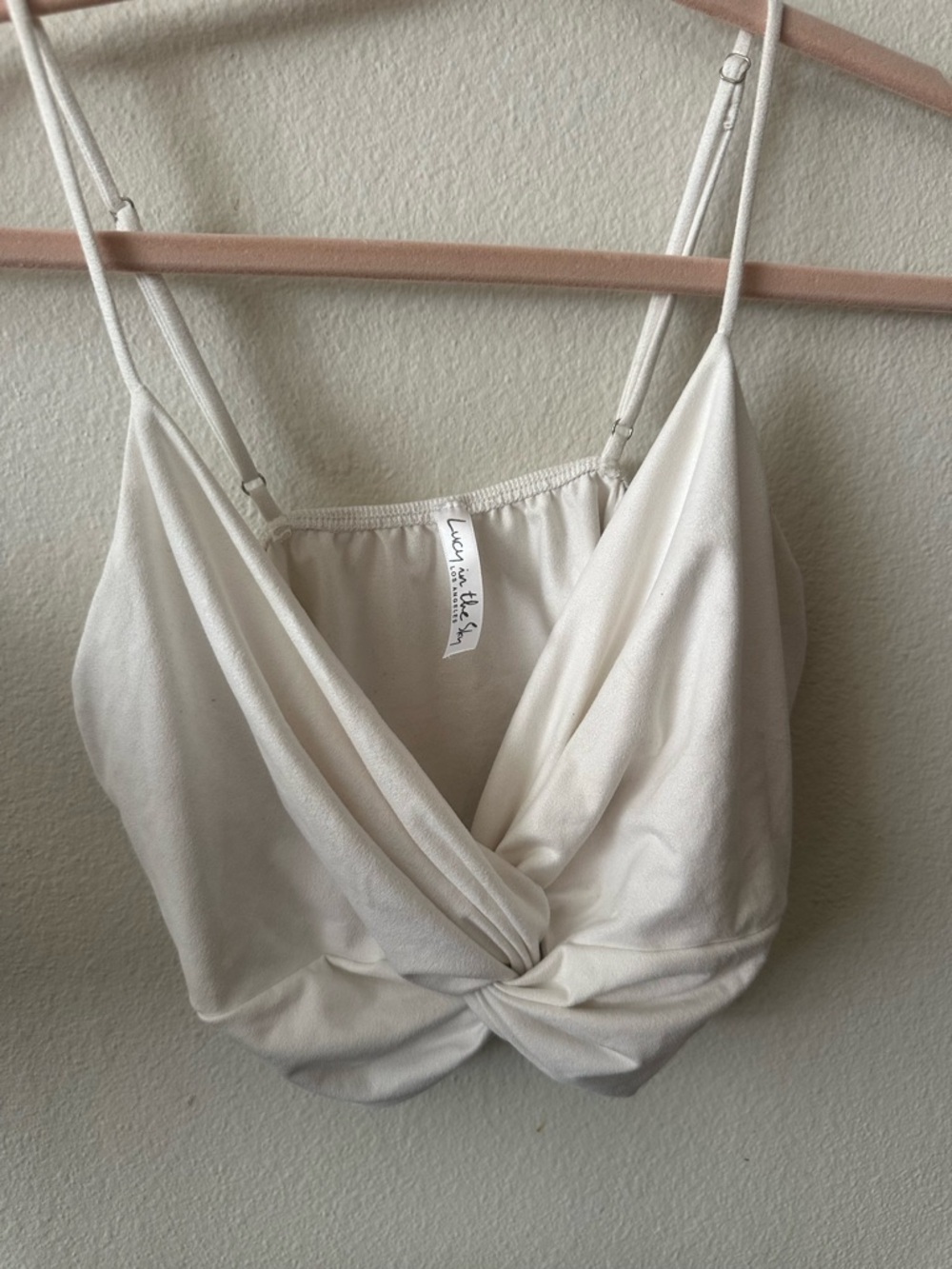 Lucy in the Sky White cropped tank top with knot in the front.
